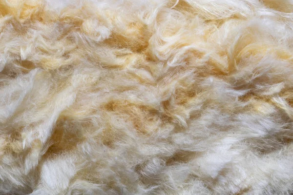 Görünür desenli sarı mineral yünü.