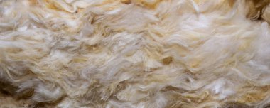 Görünür desenli sarı mineral yünü.