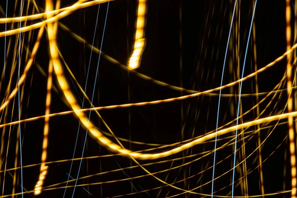 Siyah arka planda renkli çizgiler. doku