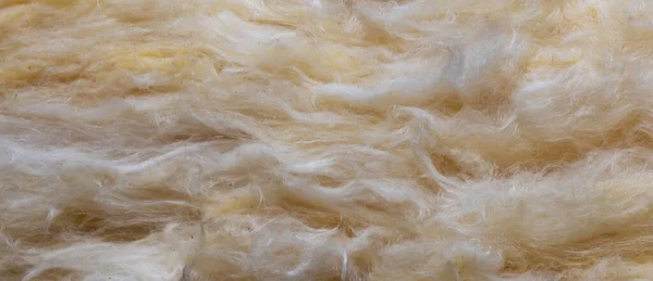 yellow mineral wool with a visible texture