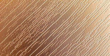 İlginç bir dokusu olan bakır bir yaprak. arkaplan