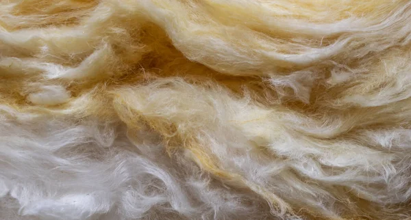 yellow mineral wool with a visible texture