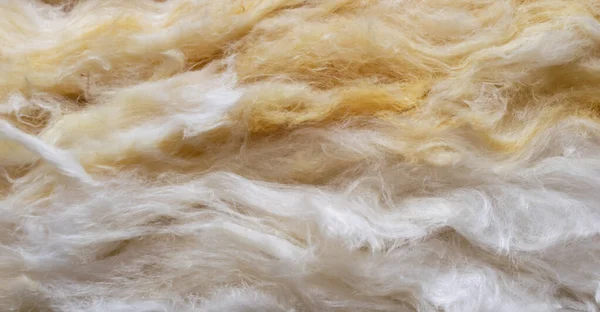 yellow mineral wool with a visible texture