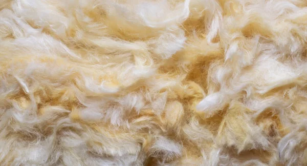 yellow mineral wool with a visible texture