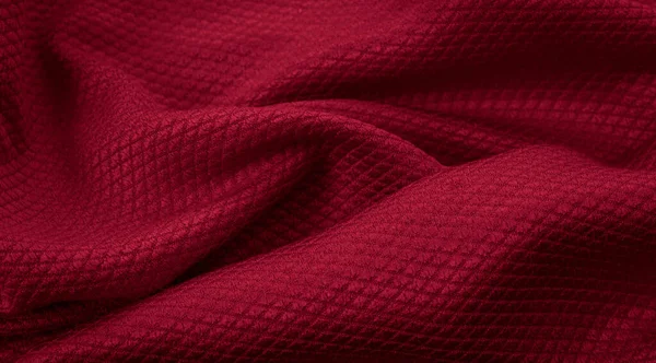 İlginç desenli kırmızı pamuk kumaş.