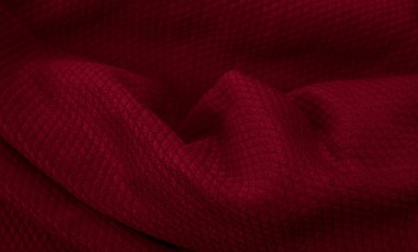 İlginç desenli kırmızı pamuk kumaş.