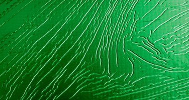 Metal levha yeşile boyanmış ilginç bir deseni var.