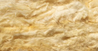 Görünür desenli sarı mineral yünü.