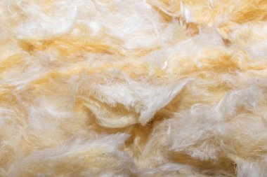 Görünür desenli sarı mineral yünü.