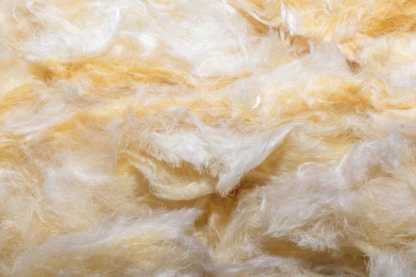Görünür desenli sarı mineral yünü.