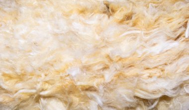 Görünür desenli sarı mineral yünü.