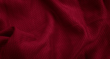 İlginç desenli kırmızı pamuk kumaş.