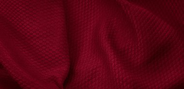 İlginç desenli kırmızı pamuk kumaş.