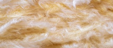 Görünür desenli sarı mineral yünü.