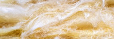 Görünür desenli sarı mineral yünü.