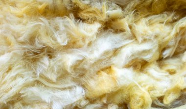 Görünür desenli sarı mineral yünü.