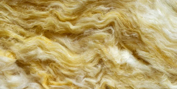 yellow mineral wool with a visible texture