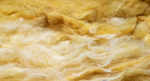 yellow mineral wool with a visible texture