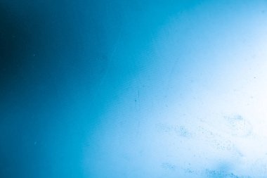 Görünür desenli mavi metal bir levha çizilmiş. arkaplan