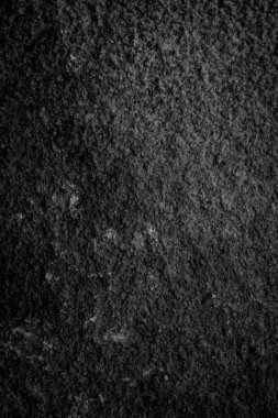 Görünür detayları olan siyah kireçtaşı bir duvar. arkaplan