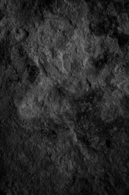 Görünür detayları olan siyah kireçtaşı bir duvar. arkaplan