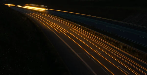 stock image lights of cars with night. long exposure