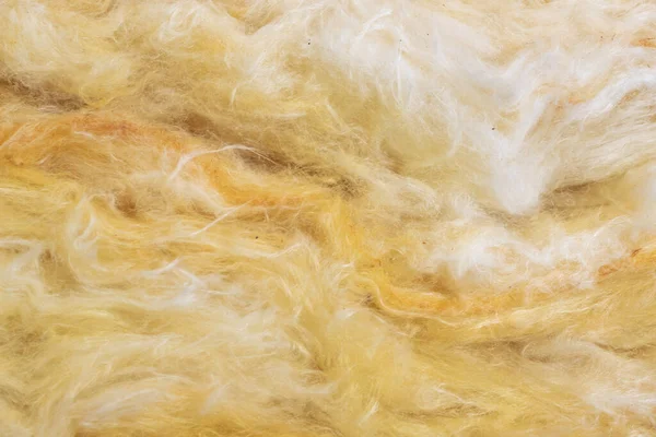 yellow mineral wool with a visible texture