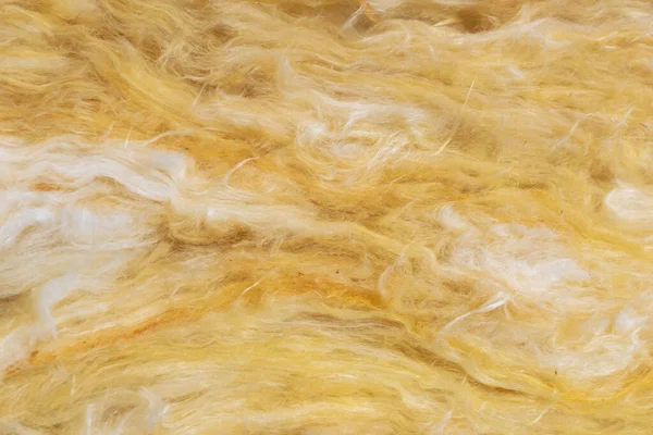 yellow mineral wool with a visible texture