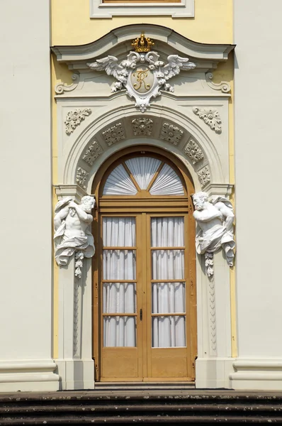 Baroque portal with atlases — Stock Photo, Image
