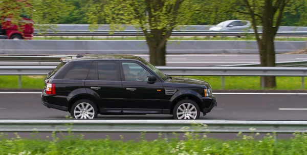 SUV driving — Stock Photo, Image