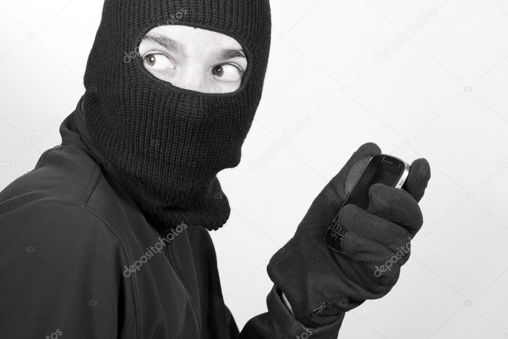 Thief with stolen smartphone