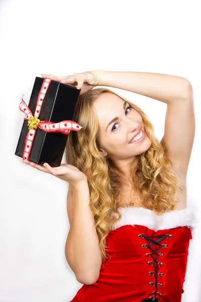 Christmas girl is happy with her present — Stock Photo, Image