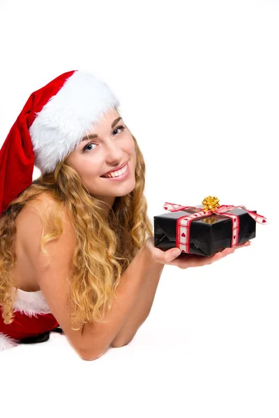 Menina de Natal está feliz com seu presente — Fotografia de Stock