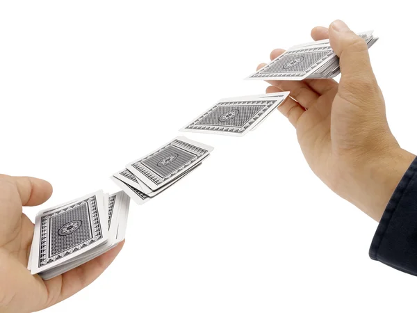 Mãos de homem baralhando cartões — Fotografia de Stock