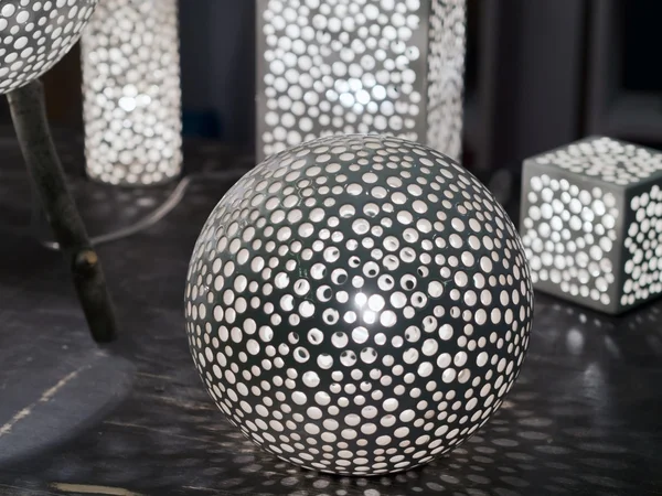 Spherical and cubic black  lamps with light inside — Stock Photo, Image