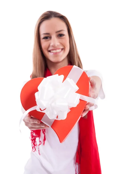 Smiling girl with gift heart — Stock Photo, Image