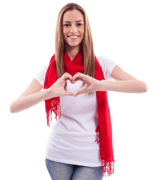 Smiling beautiful girl shows heart with hands — Stock Photo, Image