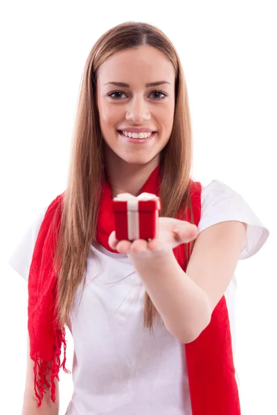 Smiling beautiful girl holding gift — Stock Photo, Image