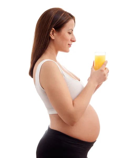 Hermosa mamá embarazada con jugo —  Fotos de Stock