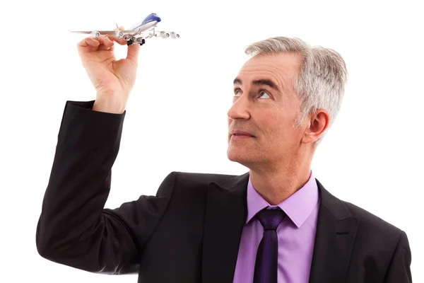 Homem segurando avião — Fotografia de Stock