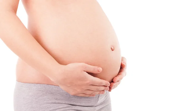 Adorable madre tocándose el estómago — Foto de Stock