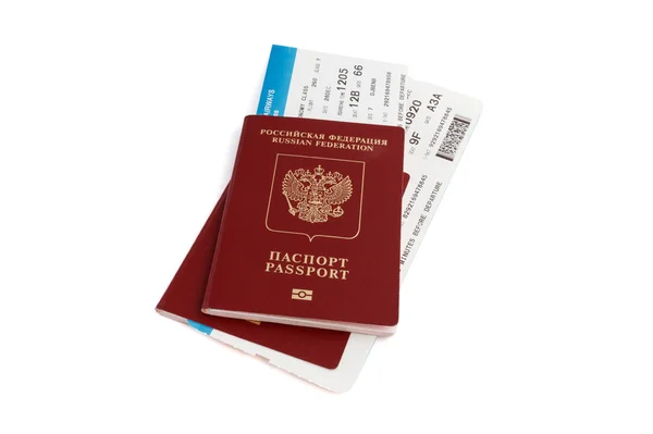 Two isolated Russian passports with boarding passes — Stock Photo, Image