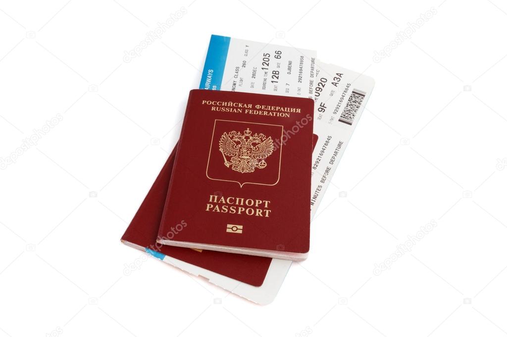 Two isolated Russian passports with boarding passes