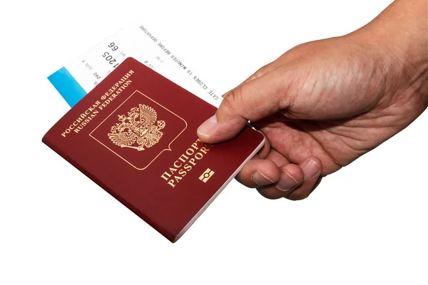 Isoalted pasaporte ruso en la mano con tarjeta de embarque — Foto de Stock