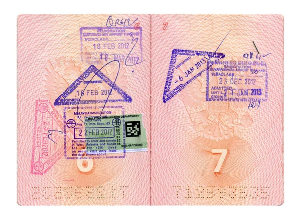 Passaporte russo aberto com carimbos — Fotografia de Stock