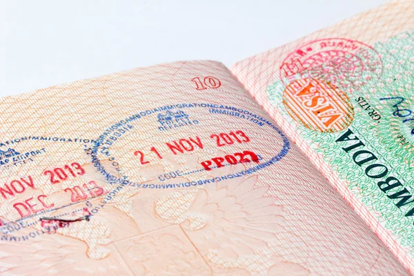 Cambodia immigration stamp in passport — Stock Photo, Image