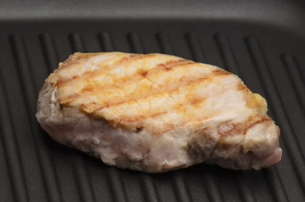 Grilled meat on the grill pan — Stock Photo, Image