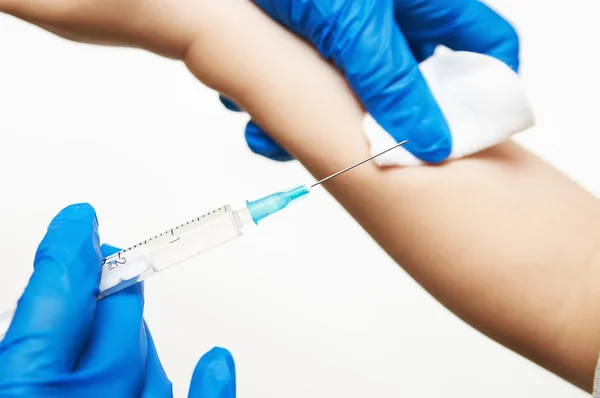 Boy and vaccine syringe — Stock Photo, Image