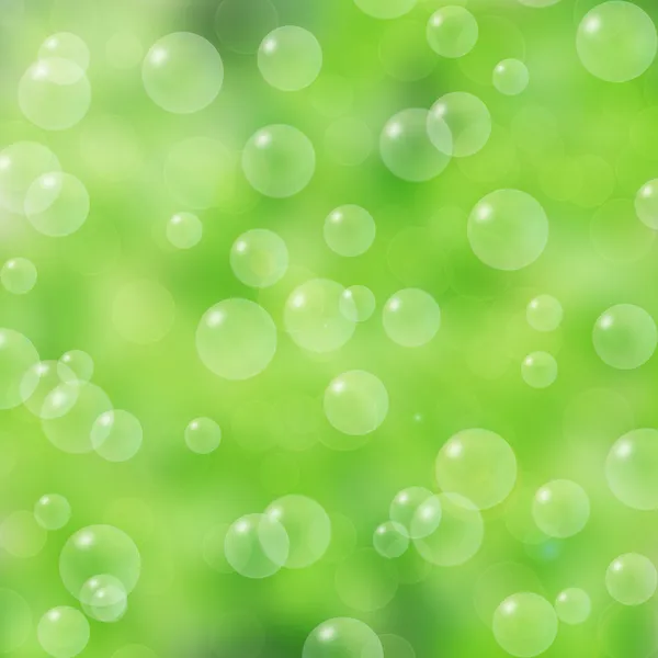 Såpbubblor på grön bakgrund Royaltyfria Stockbilder