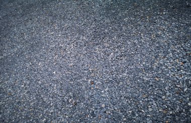 Çakıl taşlarıyla soyut bir arka plan. Plaj taşları. Kayalar.